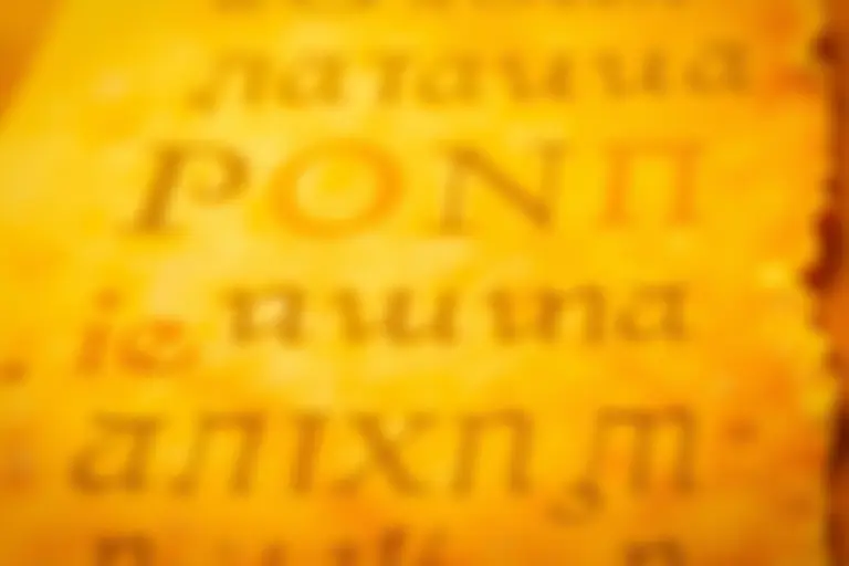 Fragment of ancient Greek text on weathered papyrus