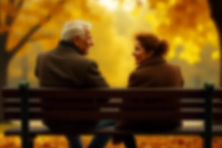 Two people sitting on a park bench in conversation with an age gap between them