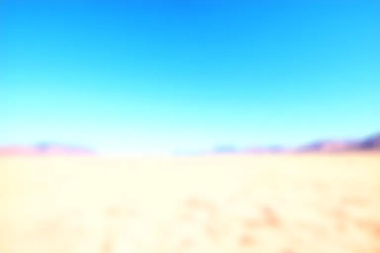 An empty desert test site with no mushroom cloud
